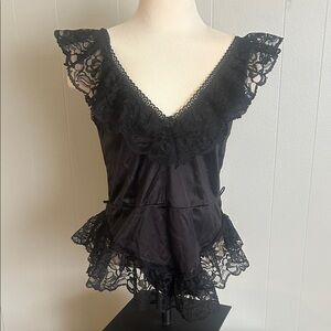 Beautiful, dainty Vintage black lingerie bodysuit adorned in lace